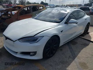 2016 Tesla Model S 90D with VIN 5YJSA1E27GF153525, listed as a IAAI auction lot 41539221 with 145,771 mi miles and . Bid and sale history available at DreamBid. Image 17.