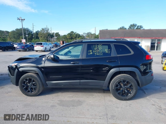 2018 Jeep Cherokee Trailhawk with VIN 1C4PJMBX3JD546332, listed as a IAAI auction lot 41269245 with 88,466 mi miles. Bid and sale history available at carsss.com. Image 14.