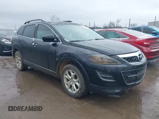 2012 Mazda CX-9 Touring z VIN JM3TB3CA8C0358410, wystawiony jako IAAI lot #41508673 z przebiegiem 227 916 mil mil oraz . Historia ofert i sprzedaży dostępna na DreamBid. Obrazek 1.