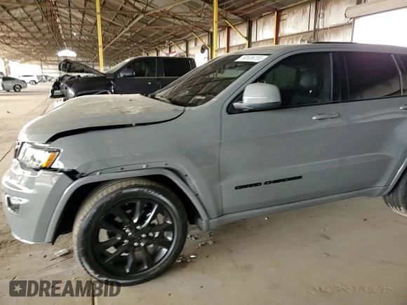 2020 Jeep Grand Cherokee Altitude z VIN 1C4RJEAGXLC405024, wystawiony jako Copart lot #58536155 z przebiegiem 67 441 mil mil oraz Szkoda całkowita • Salvage title. Historia ofert i sprzedaży dostępna na DreamBid. Obrazek 14.