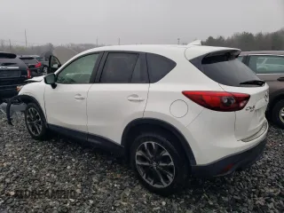 2016 Mazda CX-5 Grand Touring with VIN JM3KE4DY8G0728765, listed as a Copart auction lot 51625825 with 141,681 mi miles and Salvage Title. Bid and sale history available at carsss.com. Image 2.