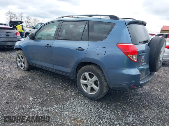 2006 Toyota RAV4 with VIN JTMBK33VX65003043, listed as a IAAI auction lot 42009844 with 294,380 mi miles. Bid and sale history available at carsss.com. Image 3.