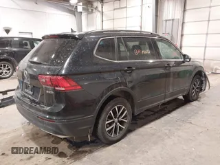 2019 Volkswagen Tiguan SE with VIN 3VV2B7AX3KM017948, listed as a IAAI auction lot 41564360 with 129,302 mi miles and . Bid and sale history available at DreamBid. Image 4.