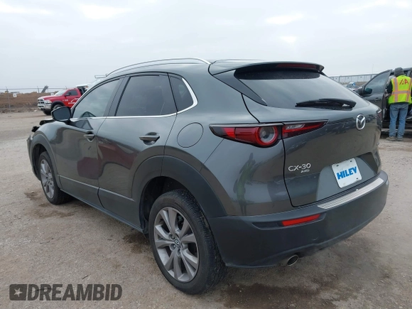 2022 Mazda CX-30 2.5 S Carbon Edition with VIN 3MVDMBCL4NM451121, listed as a IAAI auction lot 41506613 with 24,742 mi miles. Bid and sale history available at carsss.com. Image 3.