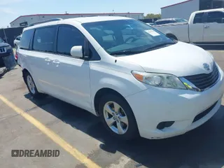 2014 Toyota Sienna LE AAS with VIN 5TDKK3DC4ES491637, listed as a IAAI auction lot 41906264 with 174,835 mi miles. Bid and sale history available at carsss.com. Image 1.