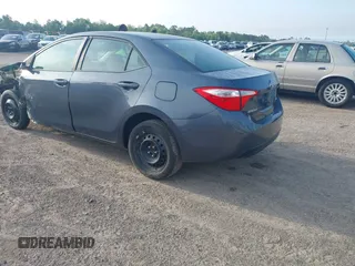 2015 Toyota Corolla L with VIN 5YFBURHE0FP283354, listed as a IAAI auction lot 41530183 with 165,228 mi miles and . Bid and sale history available at DreamBid. Image 3.