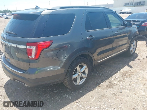 2018 Ford Explorer XLT with VIN 1FM5K7D81JGC40820, listed as a IAAI auction lot 42357205 with 95,036 mi miles and . Bid and sale history available at DreamBid. Image 4.
