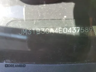 2014 Mazda CX-9 Touring z VIN JM3TB3CA4E0437589, wystawiony jako Copart lot #46572515 z przebiegiem 143 759 mil mil oraz Szkoda całkowita • Salvage title. Historia ofert i sprzedaży dostępna na DreamBid. Obrazek 13.