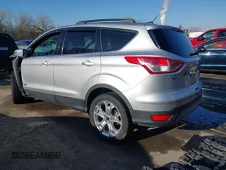 2013 Ford Escape SEL with VIN 1FMCU0HX4DUB98238, listed as a IAAI auction lot 41973221 with 131,590 mi miles and . Bid and sale history available at DreamBid. Image 3.