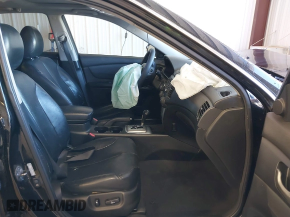2007 Kia Optima EX with VIN KNAGE124875134352, listed as a IAAI auction lot 41627381 with 183,053 mi miles. Bid and sale history available at carsss.com. Image 5.
