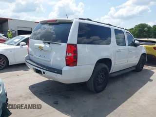 2013 Chevrolet Suburban LT with VIN 1GNSCJE08DR102735, listed as a IAAI auction lot 42228063 with 101,671 mi miles and . Bid and sale history available at DreamBid. Image 4.