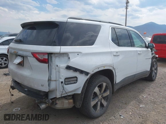 2021 Chevrolet Traverse LT Leather with VIN 1GNEVHKW1MJ213554, listed as a IAAI auction lot 40189535 with 70,232 mi miles. Bid and sale history available at carsss.com. Image 4.