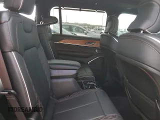 2023 Jeep Grand Cherokee Summit Reserve with VIN 1C4RJKEG5P8853916, listed as a Copart auction lot 52691735 with 18,899 mi miles and Salvage title. Bid and sale history available at DreamBid. Image 11.