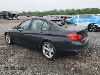 2013 BMW 3 Series 328i xDrive with VIN WBA3B5C53DF595177, listed as a Copart auction lot 57024375 with 124,873 mi miles and Salvage title. Bid and sale history available at DreamBid. Image 2.
