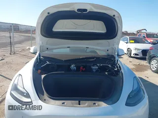 2023 Tesla Model Y Performance with VIN 7SAYGDEF1PF864976, listed as a IAAI auction lot 41667676 with Not Provided miles and . Bid and sale history available at DreamBid. Image 10.