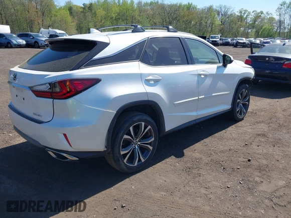 2019 Lexus RX 350 with VIN JTJBZMCA0K2041419, listed as a IAAI auction lot 42128084 with 98,994 mi miles and . Bid and sale history available at DreamBid. Image 4.