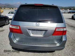 2005 Honda Odyssey EX with VIN 5FNRL38405B099581, listed as a Copart auction lot 52970815 with 218,225 mi miles and Salvage Title. Bid and sale history available at carsss.com. Image 6.