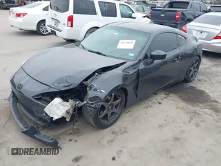 2016 Scion FR-S with VIN JF1ZNAA15G8708350, listed as a IAAI auction lot 41679656 with 111,245 mi miles. Bid and sale history available at carsss.com. Image 18.