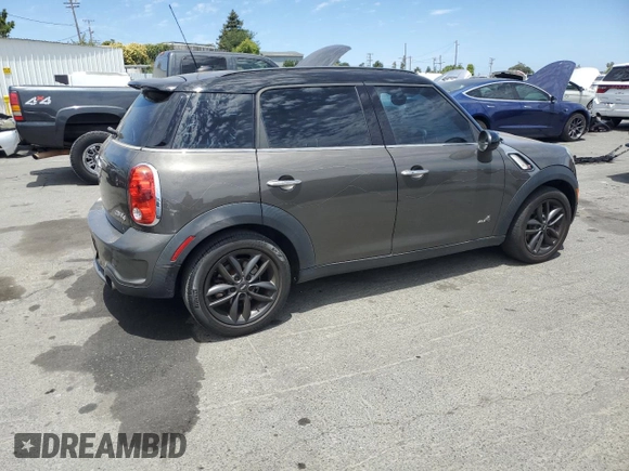 2011 MINI Countryman S with VIN WMWZC5C5XBWL55516, listed as a Copart auction lot 63239235 with 137,545 mi miles and Salvage title. Bid and sale history available at DreamBid. Image 3.