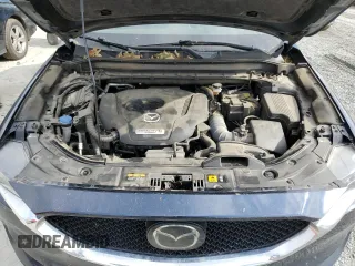 2021 Mazda CX-5 Signature with VIN JM3KFBEY3M0439658, listed as a Copart auction lot 74534464 with 50,816 mi miles and Salvage Title. Bid and sale history available at carsss.com. Image 12.