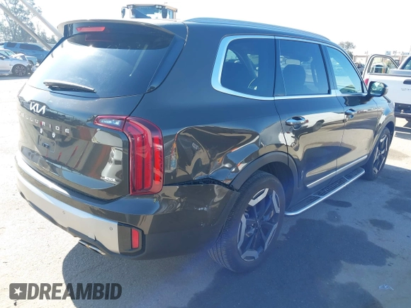 2023 Kia Telluride S with VIN 5XYP6DGC2PG387093, listed as a IAAI auction lot 42299026 with 12,895 mi miles and . Bid and sale history available at DreamBid. Image 4.