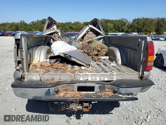 2002 GMC Sierra 1500HD SLE z VIN 1GTGK13U52F232896, wystawiony jako Copart lot #76999294 z przebiegiem Nie podano mil oraz Szkoda całkowita • Salvage title. Historia ofert i sprzedaży dostępna na DreamBid. Obrazek 6.