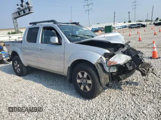 2011 Nissan Frontier Pro-4X with VIN 1N6AD0EV4BC411851, listed as a Copart auction lot 58972745 with Not provided miles and Salvage title. Bid and sale history available at DreamBid. Image 4.