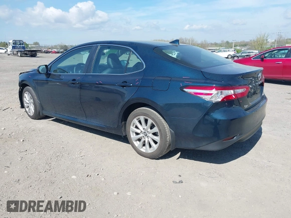 2019 Toyota Camry LE with VIN 4T1B11HK3KU254083, listed as a IAAI auction lot 42091530 with 26,635 mi miles and . Bid and sale history available at DreamBid. Image 3.