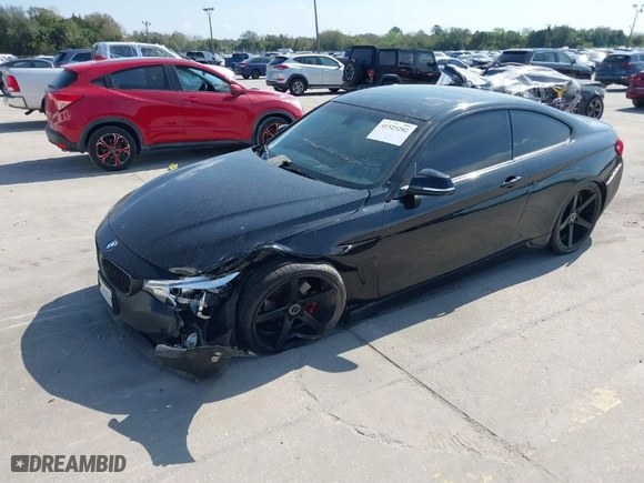 2015 BMW 4 Series 428i with VIN WBA3N7C59FK223386, listed as a IAAI auction lot 41525282 with 72,852 mi miles. Bid and sale history available at carsss.com. Image 2.