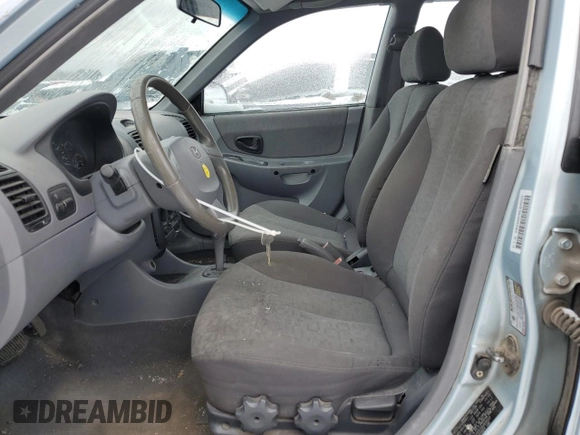 2005 Hyundai Accent GLS with VIN KMHCG45C05U605523, listed as a Copart auction lot 43811815 with 190,638 mi miles and Salvage Title. Bid and sale history available at carsss.com. Image 7.