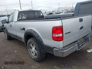 2005 Ford F-150 XL with VIN 1FTRF12W85NC00664, listed as a IAAI auction lot 42046282 with 167,105 mi miles. Bid and sale history available at carsss.com. Image 3.
