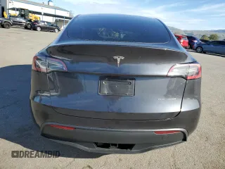 2025 Tesla Model Y Long Range with VIN 7SAYGDEE4SF272942, listed as a Copart auction lot 45817885 with 2,308 mi miles and Salvage Title. Bid and sale history available at DreamBid. Image 6.
