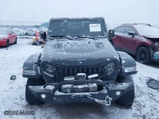 2020 Jeep Gladiator Rubicon with VIN 1C6JJTBG3LL146075, listed as a IAAI auction lot 41048823 with 130,318 mi miles. Bid and sale history available at carsss.com. Image 12.