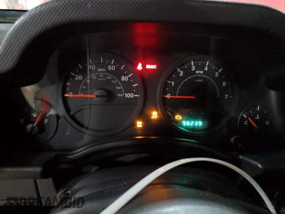 2009 Jeep Wrangler X с VIN 1J4FA24179L734789, выставлен на аукционе Copart как лот 54131245 с пробегом 98 239 миль миль и Списание • Salvage title. История ставок и продаж доступна на DreamBid. Изображение 9.