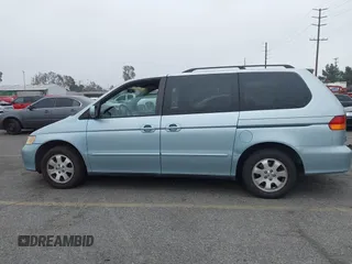 2003 Honda Odyssey EX-L with VIN 5FNRL18943B138444, listed as a IAAI auction lot 41498605 with 153,947 mi miles and . Bid and sale history available at DreamBid. Image 15.