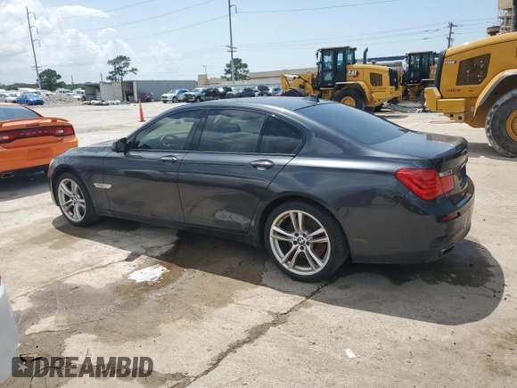 2011 BMW 7 Series 750i with VIN WBAKA8C59BCY36657, listed as a Copart auction lot 61484925 with 174,605 mi miles and Salvage title. Bid and sale history available at DreamBid. Image 2.