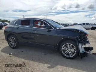 2022 BMW X2 sDrive28i with VIN WBXYH9C0XN5T86256, listed as a Copart auction lot 74173554 with 35,658 mi miles and Salvage Title. Bid and sale history available at carsss.com. Image 4.