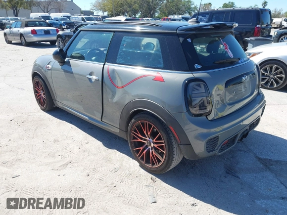 2016 MINI Hardtop John Cooper Works with VIN WMWXM9C58GT996815, listed as a IAAI auction lot 41756661 with 146,450 mi miles and . Bid and sale history available at DreamBid. Image 3.