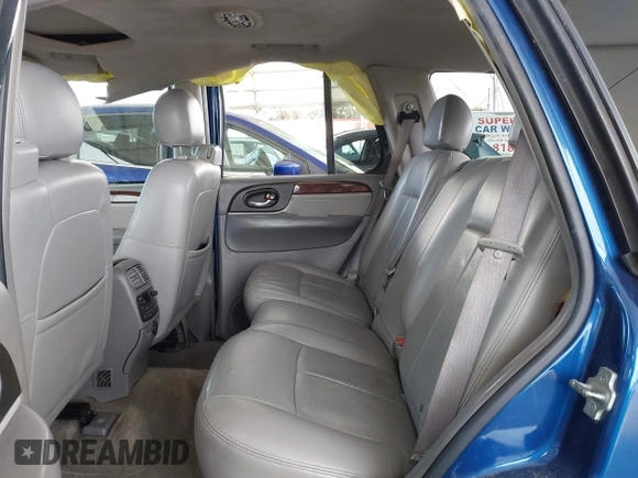 2006 GMC Envoy SLE with VIN 1GKDS13S562252049, listed as a IAAI auction lot 41940052 with 149,445 mi miles. Bid and sale history available at carsss.com. Image 8.