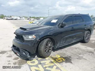 2014 Dodge Durango SXT with VIN 1C4RDHAGXEC502977, listed as a IAAI auction lot 41722180 with 155,862 mi miles. Bid and sale history available at carsss.com. Image 2.