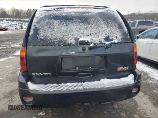 2006 GMC Envoy SLT with VIN 1GKDT13S562338202, listed as a Copart auction lot 87326504 with 158,468 mi miles and Clean Title. Bid and sale history available at carsss.com. Image 6.