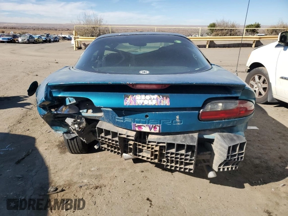 1994 Chevrolet Camaro z VIN 2G1FP22S1R2218727, wystawiony jako Copart lot #80922944 z przebiegiem 181 616 mil mil oraz Szkoda całkowita • Salvage title. Historia ofert i sprzedaży dostępna na DreamBid. Obrazek 6.