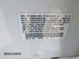 2013 Honda Pilot EX-L with VIN 5FNYF3H51DB013964, listed as a IAAI auction lot 41831598 with 155,959 mi miles and . Bid and sale history available at DreamBid. Image 9.