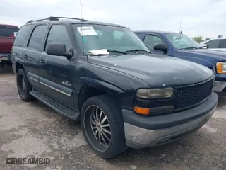 2003 Chevrolet Tahoe LT with VIN 1GNEC13Z13J297511, listed as a IAAI auction lot 41902595 with 293,195 mi miles. Bid and sale history available at carsss.com. Image 1.