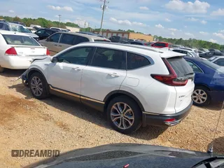 2022 Honda CR-V Touring z VIN 5J6RT6H93NL038701, wystawiony jako IAAI lot #42097294 z przebiegiem 55 402 mil mil oraz . Historia ofert i sprzedaży dostępna na DreamBid. Obrazek 3.