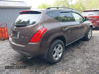 2004 Nissan Murano SE z VIN JN8AZ08W24W318003, wystawiony jako IAAI lot #42355687 z przebiegiem 98 013 mil mil oraz . Historia ofert i sprzedaży dostępna na DreamBid. Obrazek 4.