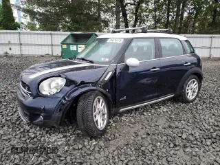 2015 MINI Countryman S z VIN WMWZC5C59FWP43388, wystawiony jako Copart lot #56876375 z przebiegiem 58 952 mil mil oraz Szkody całkowita. Historia ofert i sprzedaży dostępna na DreamBid. Obrazek 1.