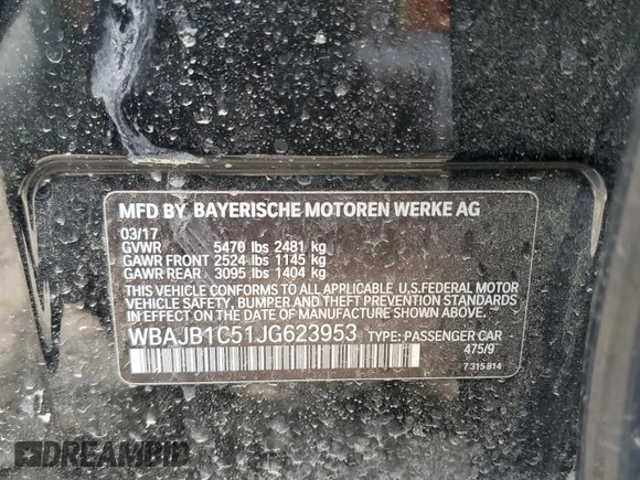 2018 BMW 5 Series 530e xDrive with VIN WBAJB1C51JG623953, listed as a Copart auction lot 51149905 with 86,799 mi miles and Salvage title. Bid and sale history available at DreamBid. Image 12.