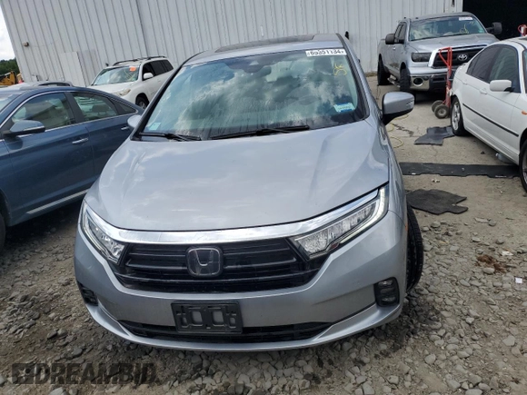 2021 Honda Odyssey EX-L with VIN 5FNRL6H79MB044718, listed as a Copart auction lot 65351134 with 28,888 mi miles and Salvage Title. Bid and sale history available at DreamBid. Image 5.