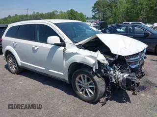 2013 Dodge Journey SXT with VIN 3C4PDCBG0DT701712, listed as a IAAI auction lot 42015263 with 92,533 mi miles. Bid and sale history available at carsss.com. Image 1.